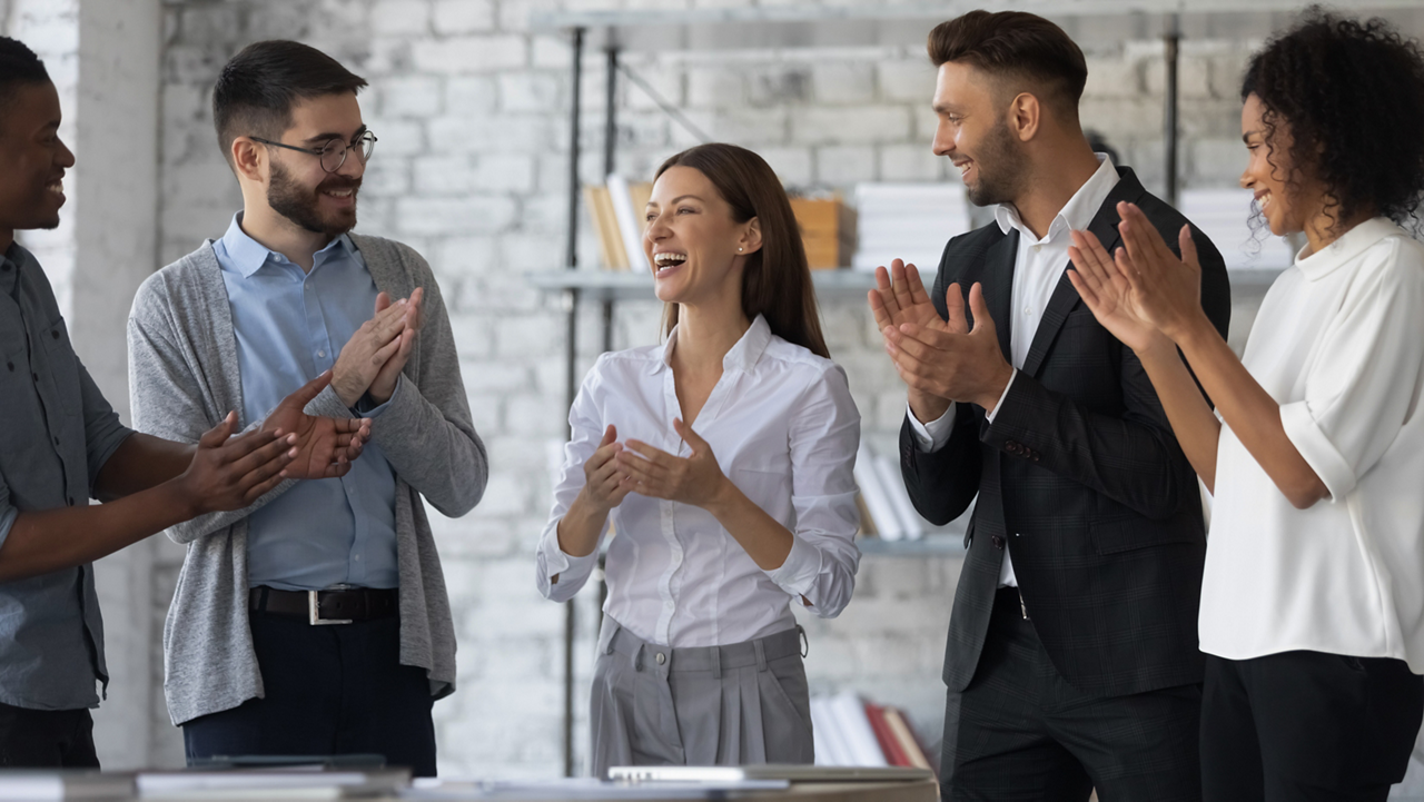 Employees smiling together